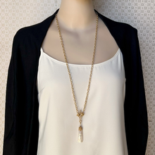 Load image into Gallery viewer, mannequin wearing a mother of pearl pendant on gold plated chain