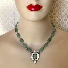 Load image into Gallery viewer, art deco rhinestone set pendant with green faceted aventurine bead chain displayed on a mannequin