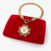 Load image into Gallery viewer, necklace made with vintage Maltese cross pendant, chain and clasp displayed on a red velvet jewellery boxon