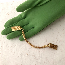 Load image into Gallery viewer, textured sweater clip displayed on a gloved hand