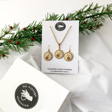 Load image into Gallery viewer, Banjo themed jewellery set with necklace and earrings on a My Vintage Obsession card, surrounded tissue paper and Christmas greenery.