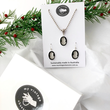 Load image into Gallery viewer, Cameo jewellery set with necklace and earrings on a My Vintage Obsession card, surrounded by tissue paper and Christmas greenery.