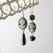 Load image into Gallery viewer, Pair of earrings with vintage cameos and beads hanging against a white background
