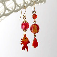 Load image into Gallery viewer, asymmetric earrings in red and orange with vintage koi charm hanging from a white ire frame
