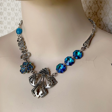 Load image into Gallery viewer, vintage assemblage necklace in blue and silver tones displayed on a mannequin
