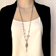 Load image into Gallery viewer, A long reimagined vintage necklace with pink pearls, chandelier crystals,rhinestone filigree pendant and clear crystal drop displayed on a mannequin
