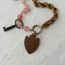 Load image into Gallery viewer, reverse side of medallion, close up of chain and beads

