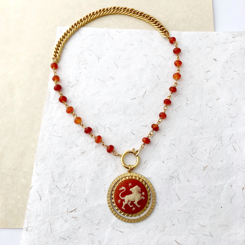 vintage zodiac resin cameo in vintage pendant setting with carnelian beads  and gold chain