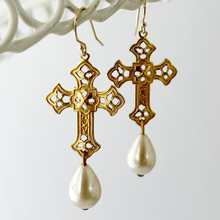 Load image into Gallery viewer, Gold cross earrings with pearl drops on a white background
