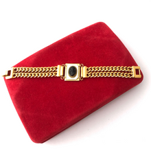 Load image into Gallery viewer, double strand gold chain bracelet with black glass cameo on mother-of-pearl displayed on a red velvet jewellery box
