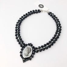 Load image into Gallery viewer, reimagined vintage victorian gothic cameo necklace with vintage Czech glass beads laying flat on a white background
